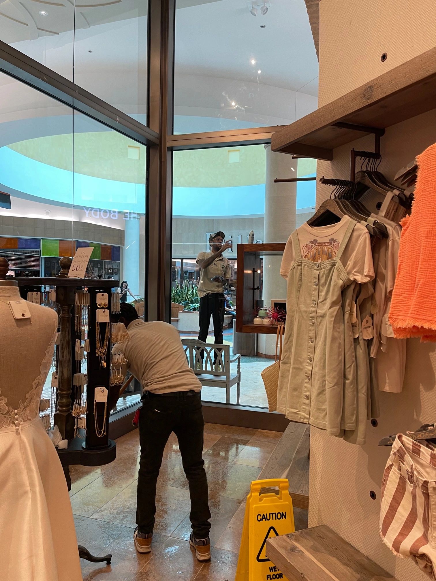 Window cleaning inside a retail store